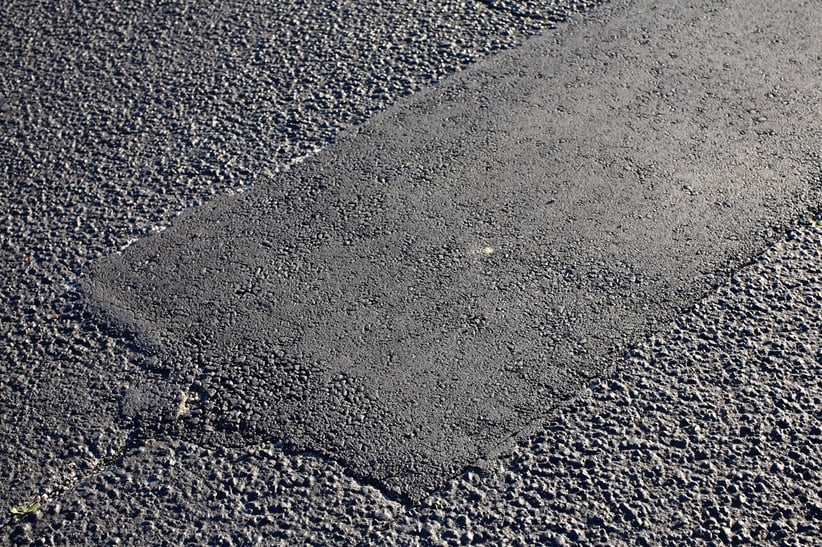Asphalt patch in parking lot