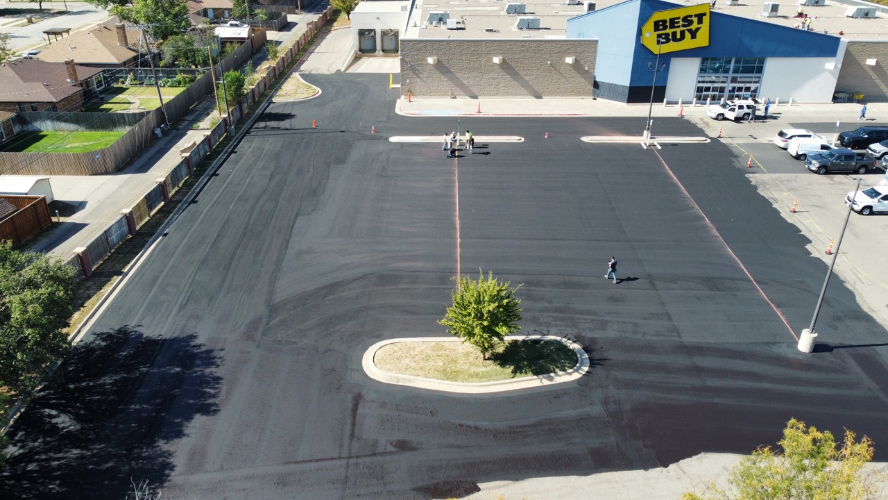 large commercial retailer with freshly micropaved parking lot