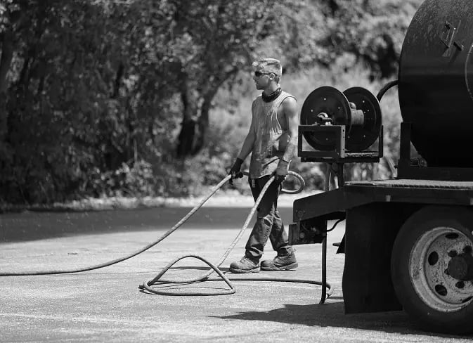 Construction man with hose
