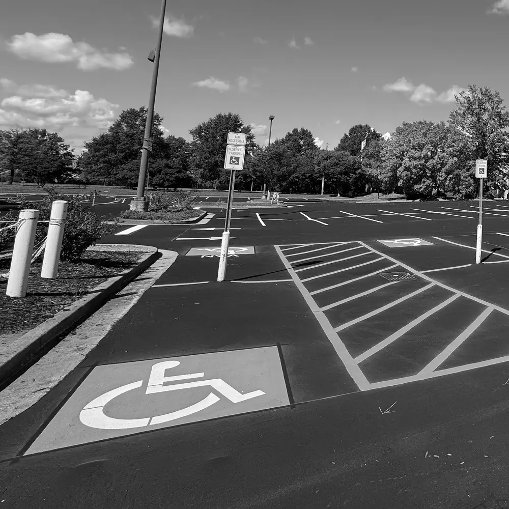 Handicap parking sign and painted markings